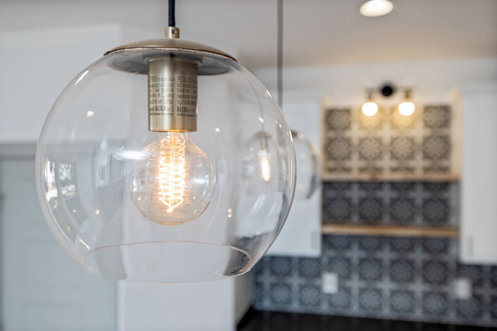 Sample image of a glass pendant light with a filament bulb